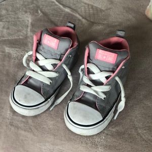 Grey and a pink high top converse Size 9